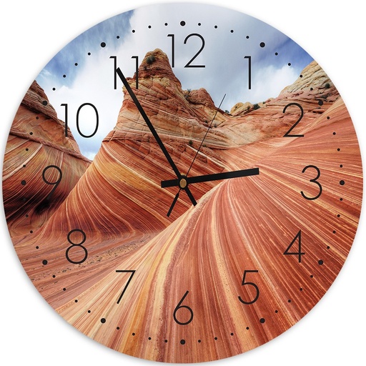 Horloge murale arrondie et analogique avec décor roches colorées